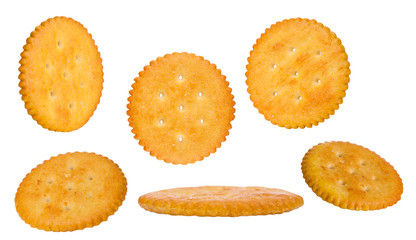 Round cheese crackers with salt isolated on white