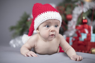Little cute baby girl with santa hat