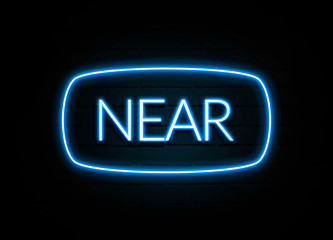 Near  - colorful Neon Sign on brickwall