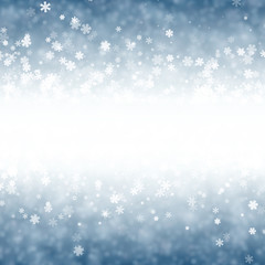 Blue winter background with snowflakes.