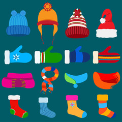Set of Christmas warm winter clothes in flat style on blue background