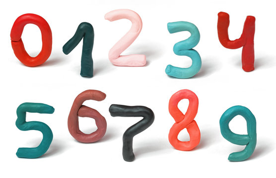Colorful plasticine numbers set isolated on a white background. Hand made modeling clay