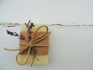 Handmade natural bath spa lavender soap on vintage wooden background. Soap making. Soap bars. Spa, skin care.