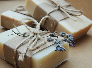 Handmade spa lavender soap on dark background. Soap making. Soap bars. Spa, skin care.