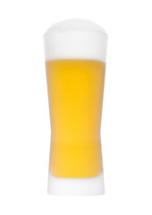 Cold frosted glass of lager beer with foam