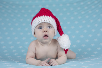 Little cute baby girl with santa hat