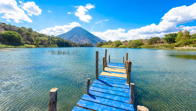 Beautiful bay of Lake Atitlan with view to Volcano San Pedro  in highlands of Guatemala, Central America