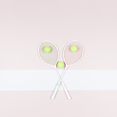 tennis balls on rackets