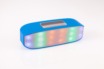 Portable mini blue tooth loudspeaker isolated on a white background.