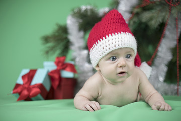 Little cute baby girl with santa hat
