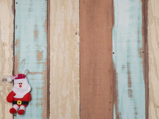 Christmas decoration cute object with wood background .