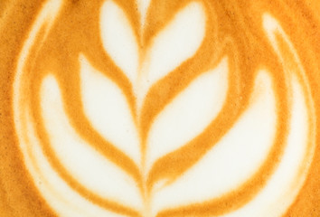 Close up tree shape latte art in coffee cup texture background.