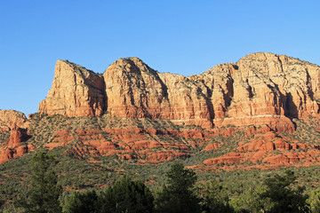 Fototapeta premium Red rock formation in Red Rock State Park along Oak Creek Canyon, a riparian habitat in Verde Valley, within Yavapai county, Sedona, Arizona, USA including Coconino National Forest.