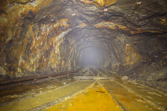 Underground abandoned gold ore mine shaft tunnel gallery passage