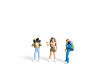 Fototapeta premium Miniature Backpacker isolated on white background