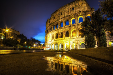 Fototapeta na wymiar Colosseum Reflection at night