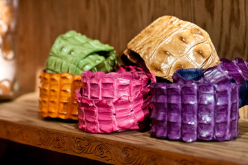 Colorful rolls of alligator skin, texture