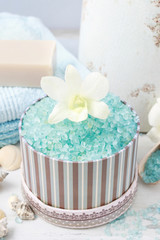 Stripped box with sea salt, towel in the background.