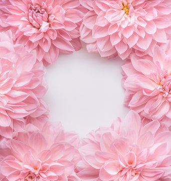 Fototapeta Creative pastel pink flowers frame, top view. Layout  or greeting card for Mothers day, wedding or happy event