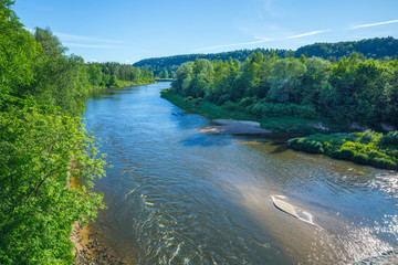 Naklejka na ściany i meble Latvian national park and river Gauja at city Sigulda.