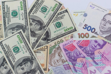 Fototapeta na wymiar dollars and new Ukrainian hryvnia