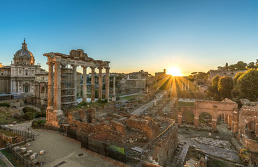 Naklejka na ściany i meble Rome, Italy - The Imperial Fora archeological ruins, at the dawn.