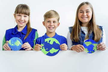 Kids with a globe