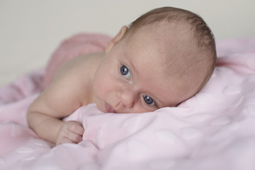 Cute happy baby girl crawling 