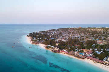 Foto auf Acrylglas Nungwi Strand, Tansania Beautiful Zanzibar Nungwi beach at sunset time aerial view