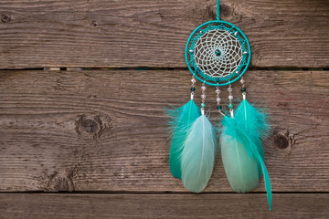 Handmade dream catcher with feathers threads and beads rope hanging