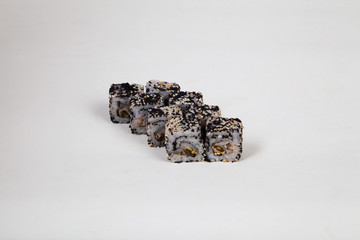 Japanese food Sushi rolls with fish on a white background