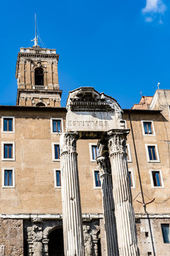 Remains of antique Temple of Vespasian and Tabularium, Forum Romanum, Rome, Italy. View of the columns of ancient temple and Tabularium in Foro Romano.
