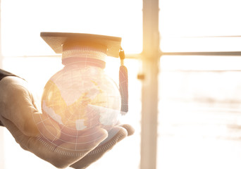 Education in Global, Graduation cap on Businessman holding Earth globe model map with Radar background in hands. Concept of global business, abroad educational, Back to School.