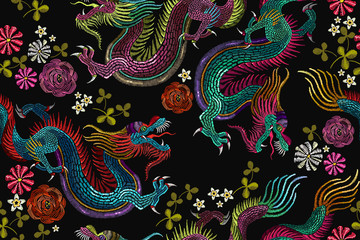 Embroidery vintage chinese dragons and flowers seamless pattern. Classical embroidery asian dragons and beautiful flowers seamless pattern. Art dragons t-shirt design. Clothes, textile art