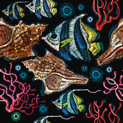 Embroidery sea life, sea shells, corals, tropical fishes seamless pattern. Fashionable clothes. Classical embroidery tropical sea, wave, fishes, corals, shells seamless fashion pattern