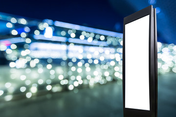 Blank billboard and blurred light spot background at festival