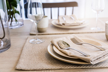 dining set with dish and spoon on white clean napkin