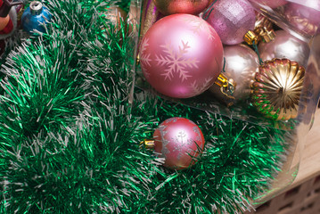 Christmas green tinsel, glass balls,