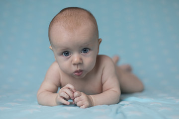 Cute happy baby girl crawling 