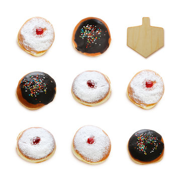 jewish holiday Hanukkah image with traditional doughnuts and spinning top isolated on white.