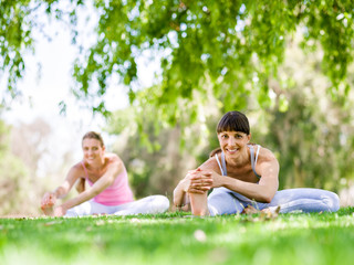 Young women exercising in the park