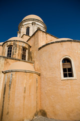 Santorini, Greece - church with blue dome on blue sky background