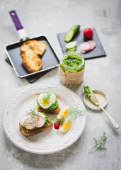rosted bread with green pesto and egg