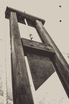 Black and white picture of a Guillotine in Palazzo dei Consoli in Gubbio, Umbria, Italy
