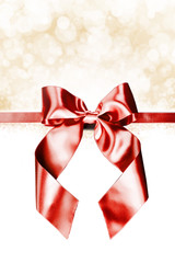 Red gift bow on white
