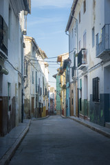 Fototapeta na wymiar Narrow Street in the ancient city of Xativa, Spain
