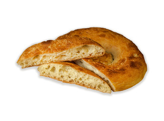 Naan bread isolated on white background. Top view. Sliced tandoor bread closeup. Slices of home-made bread on white background. Orient, asian, indian cuisine.