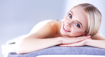 Obraz na płótnie Canvas Young woman lying on a massage table,relaxing . Woman. Spa salon