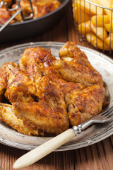 Baked wings, served with dip or baked potatoes.