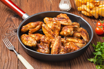 Baked wings, served with dip or baked potatoes.